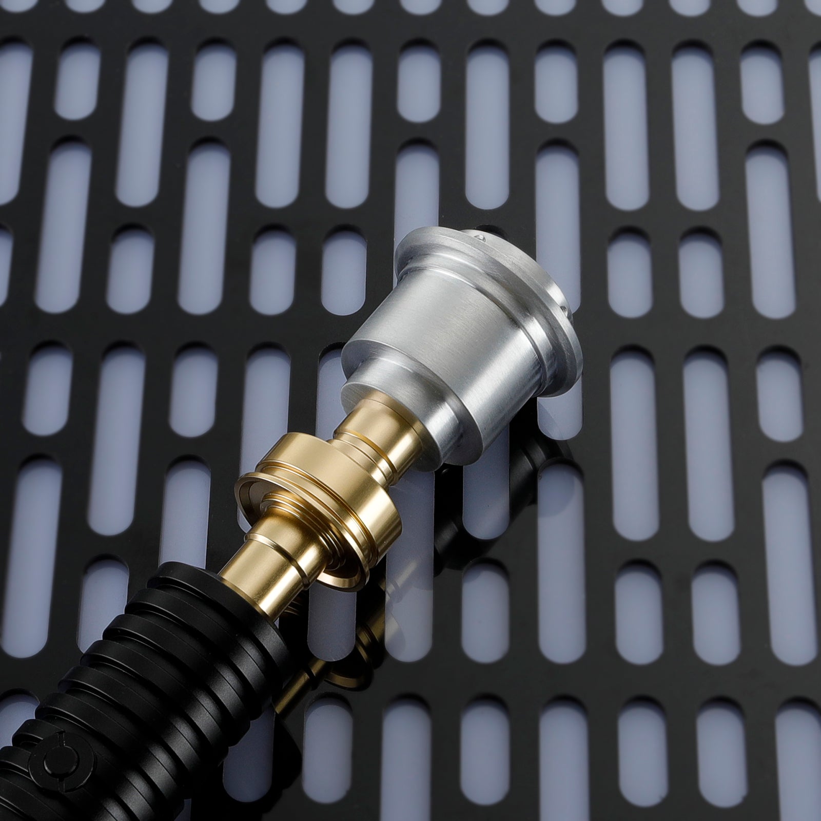 Obi-Wan Kenobi’s lightsaber hilt (gold accent detail)