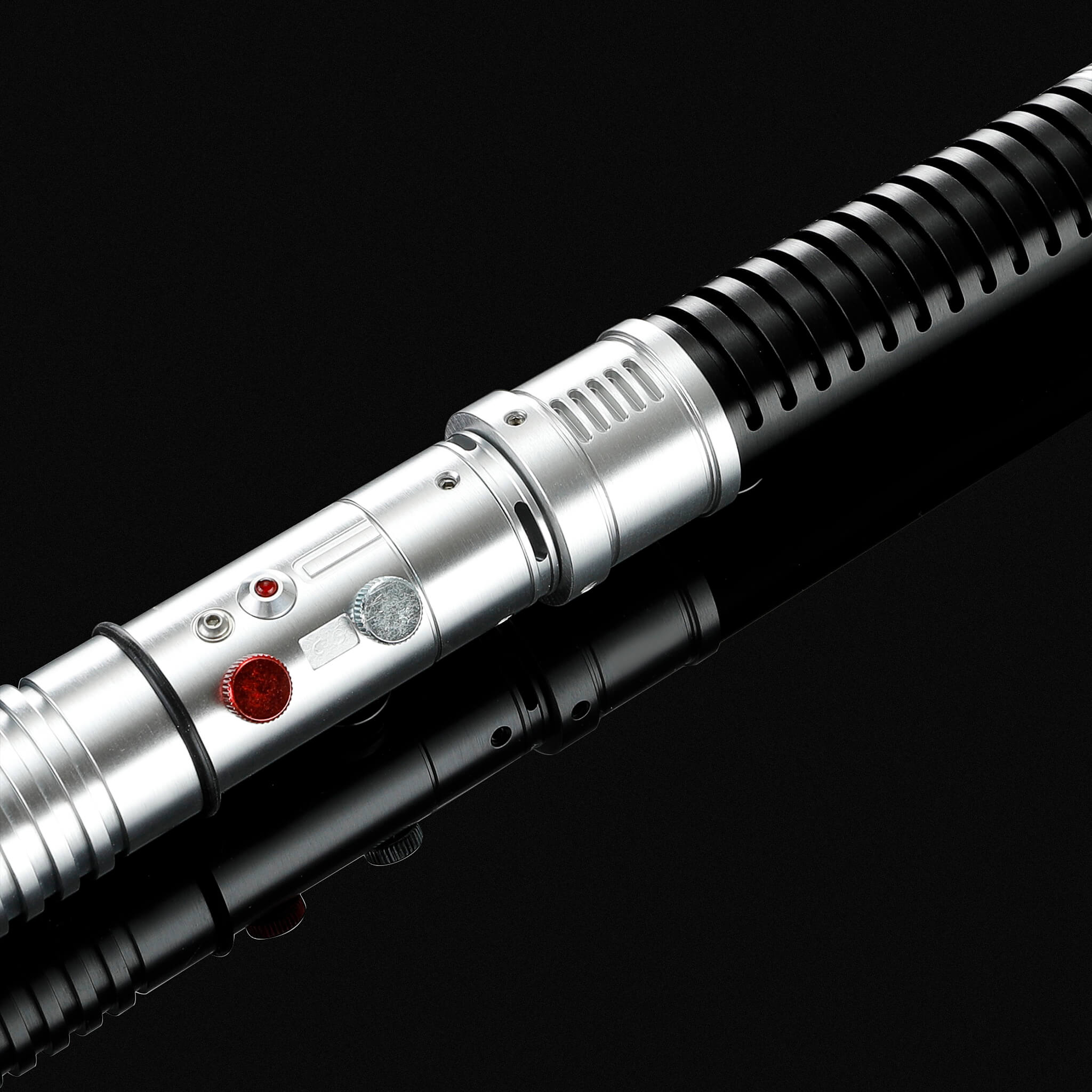 Metal lightsaber hilt control switch and activation button detail