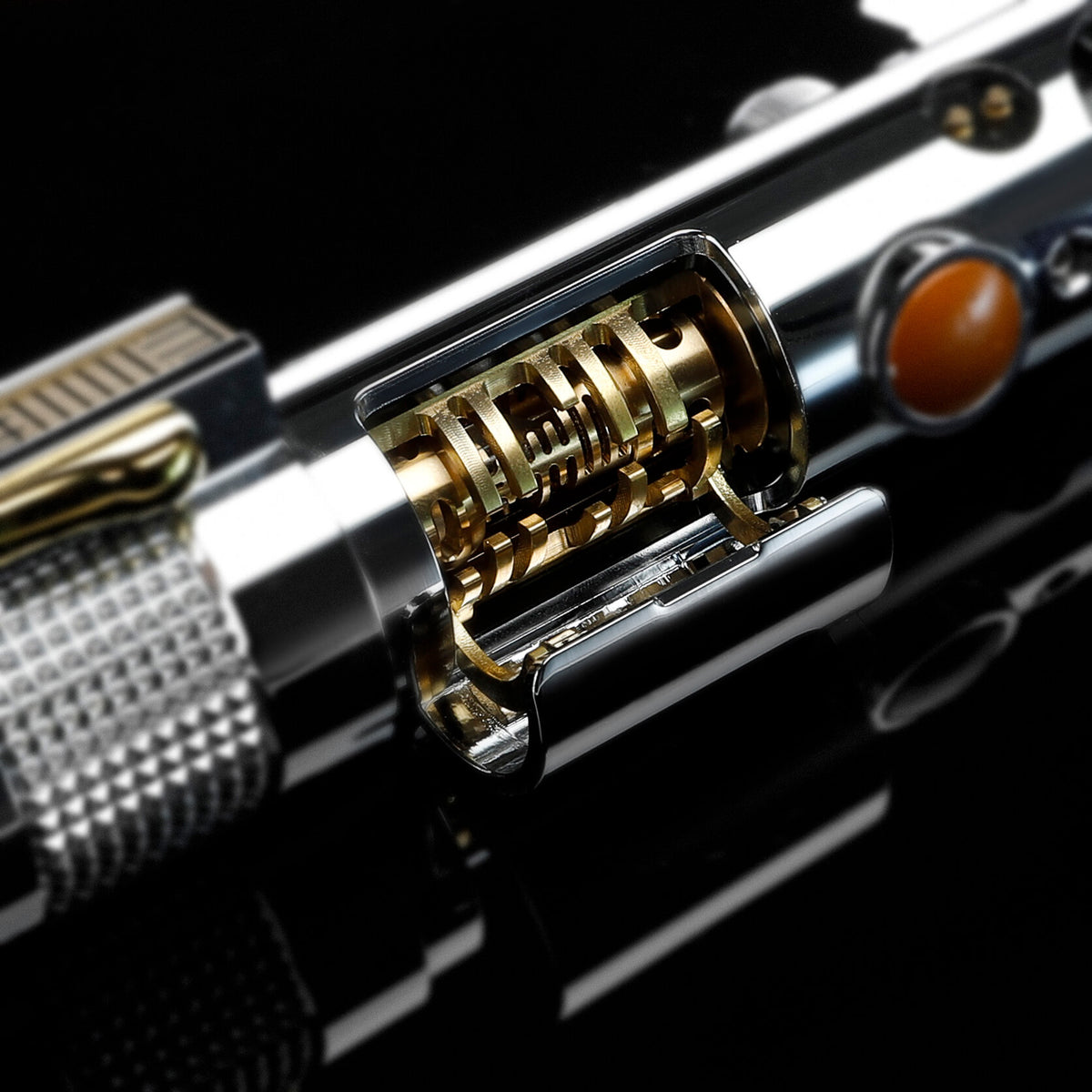 Close-up of glowing Kyber crystal chamber on Ani EP3 metal saber hilt