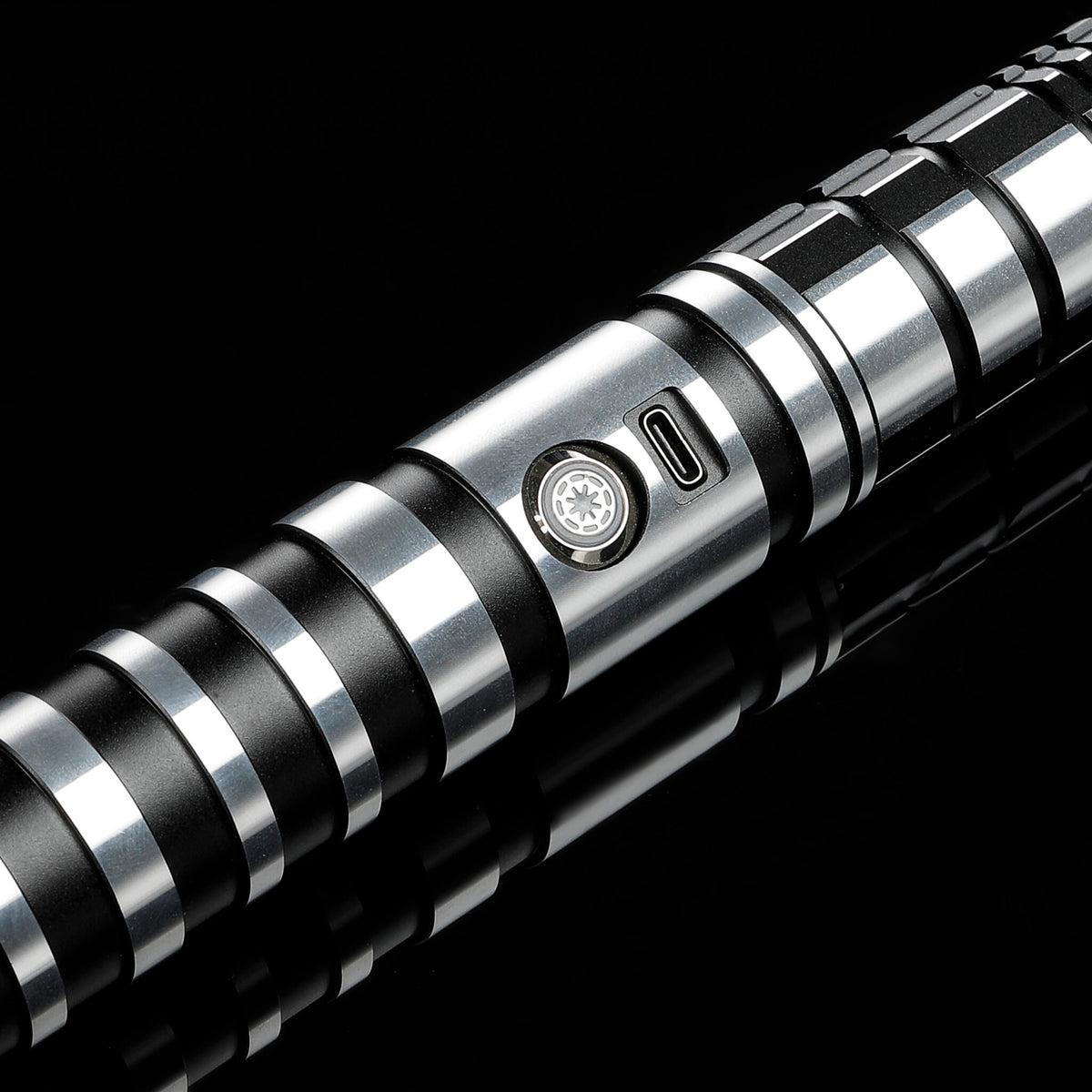 Metal lightsaber control switch and charging assembly