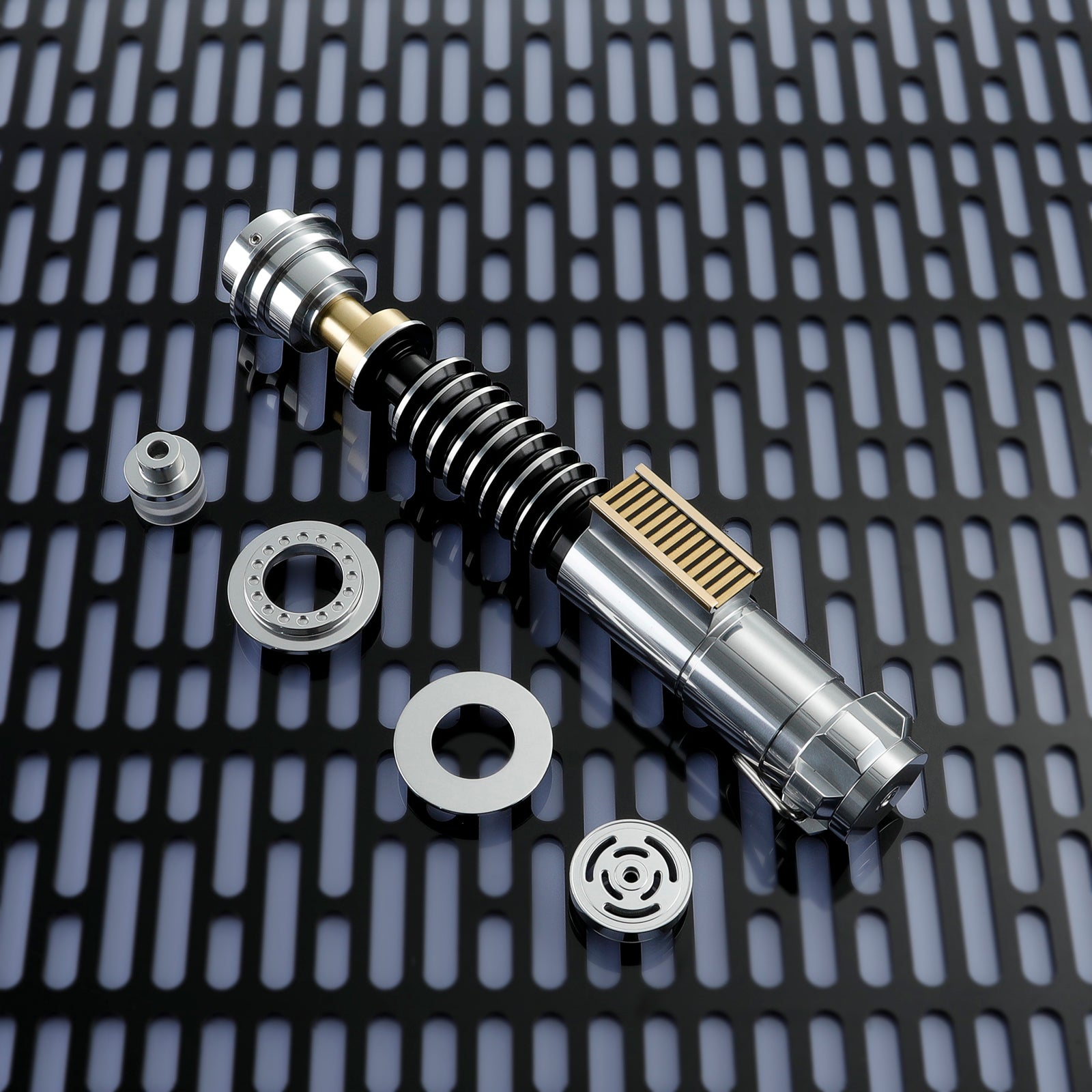 Electro-tactile feedback grooves on Luke Saber grip syncing blade intensity to Jedi focus levels