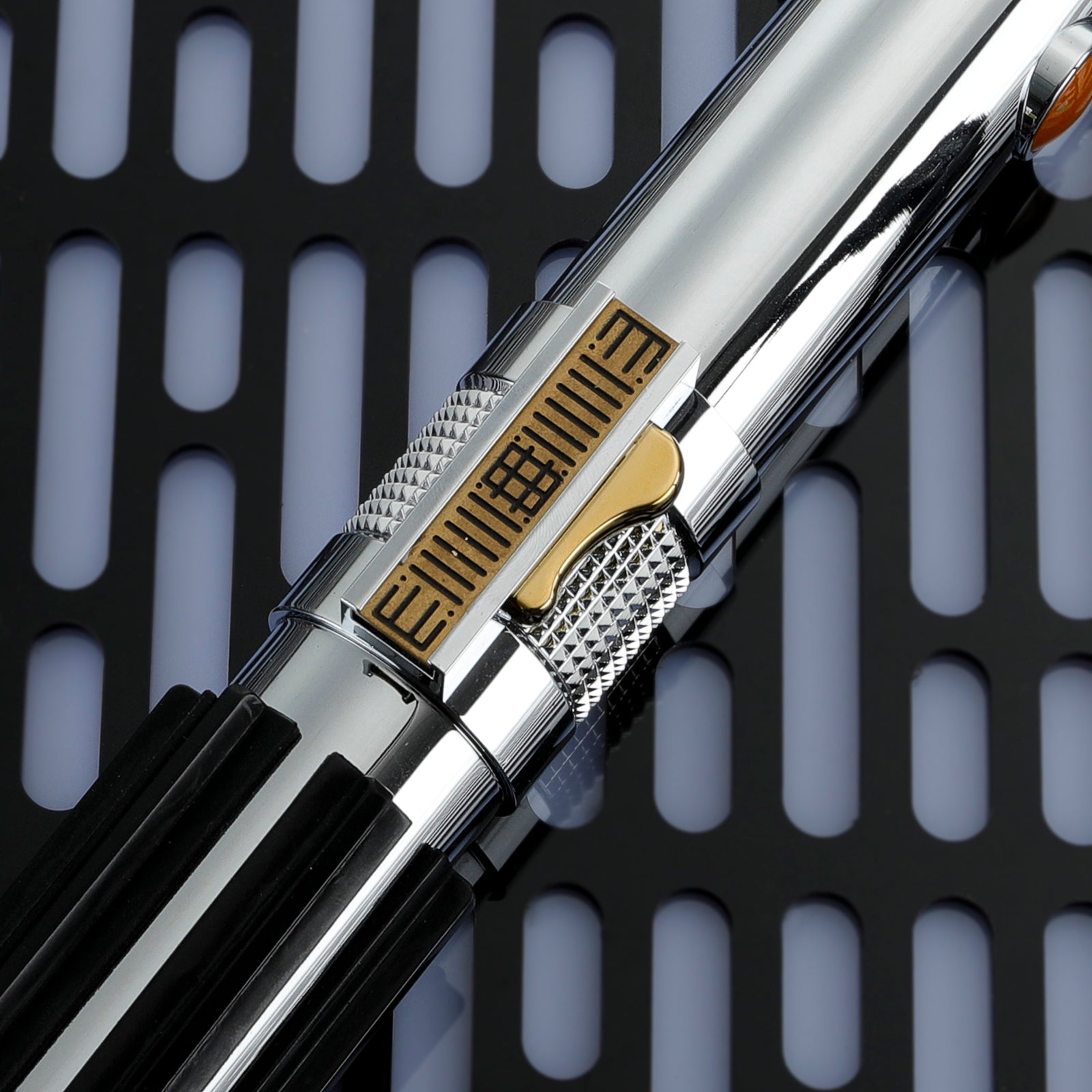 Close-up of Anakin EP3 Saber Golden Activation Plate and Chrome Detail