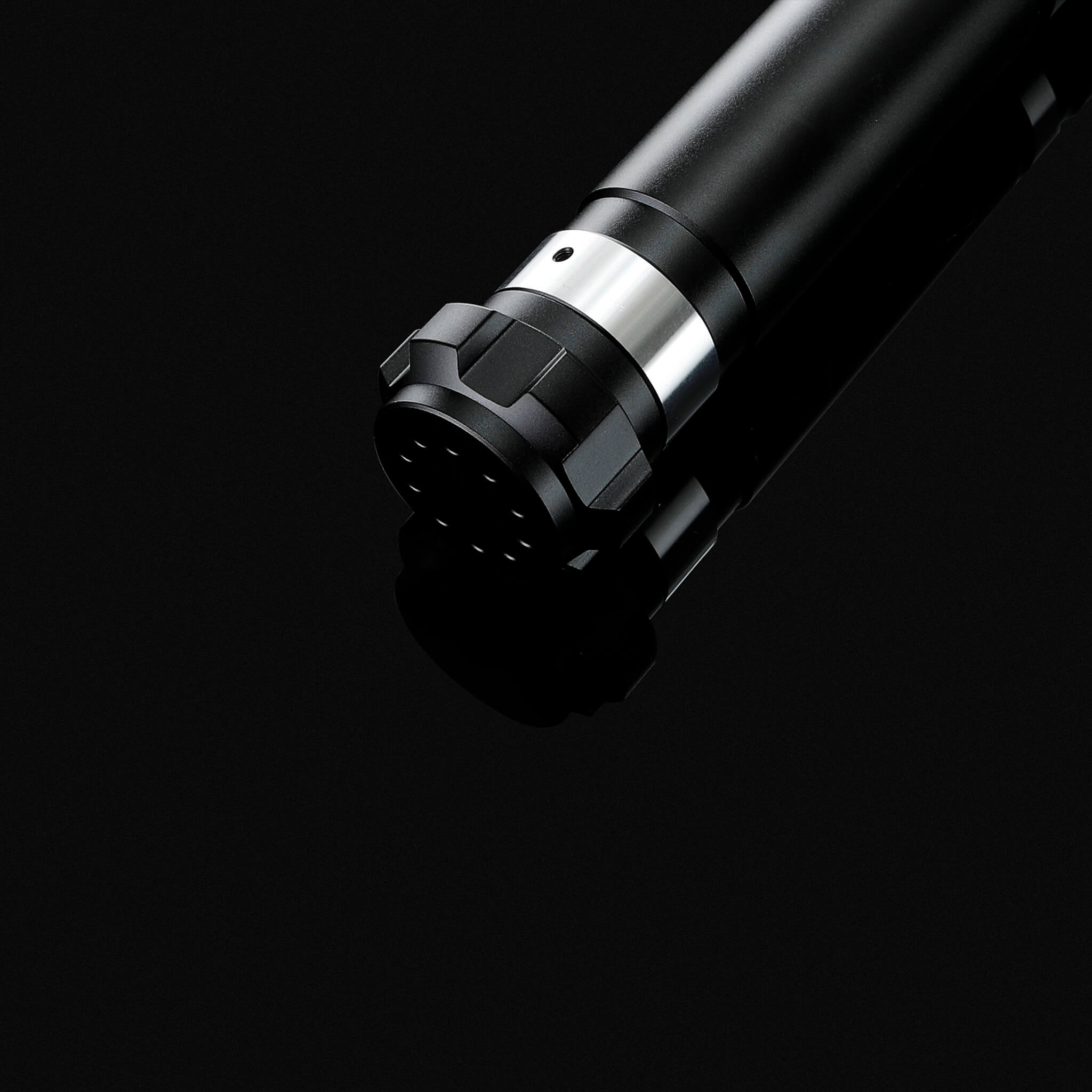 Bottom view of the durable metal hilt showing the high-quality speaker cap of the cosplay saber.