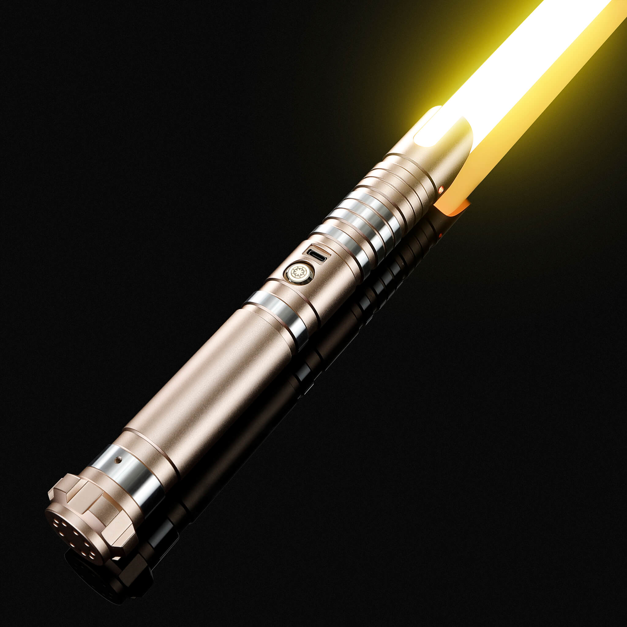 Gold metal hilt infinite color changing light saber glowing with a vibrant yellow blade.