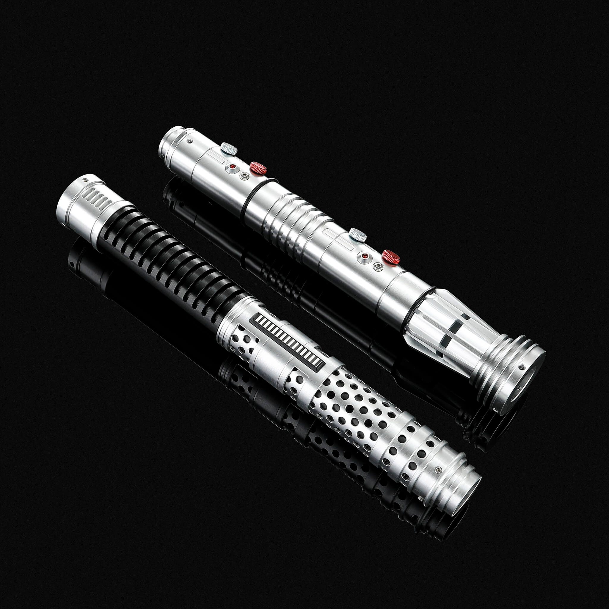 Dual metal hilts of Maul and Ventress lightsabers side by side