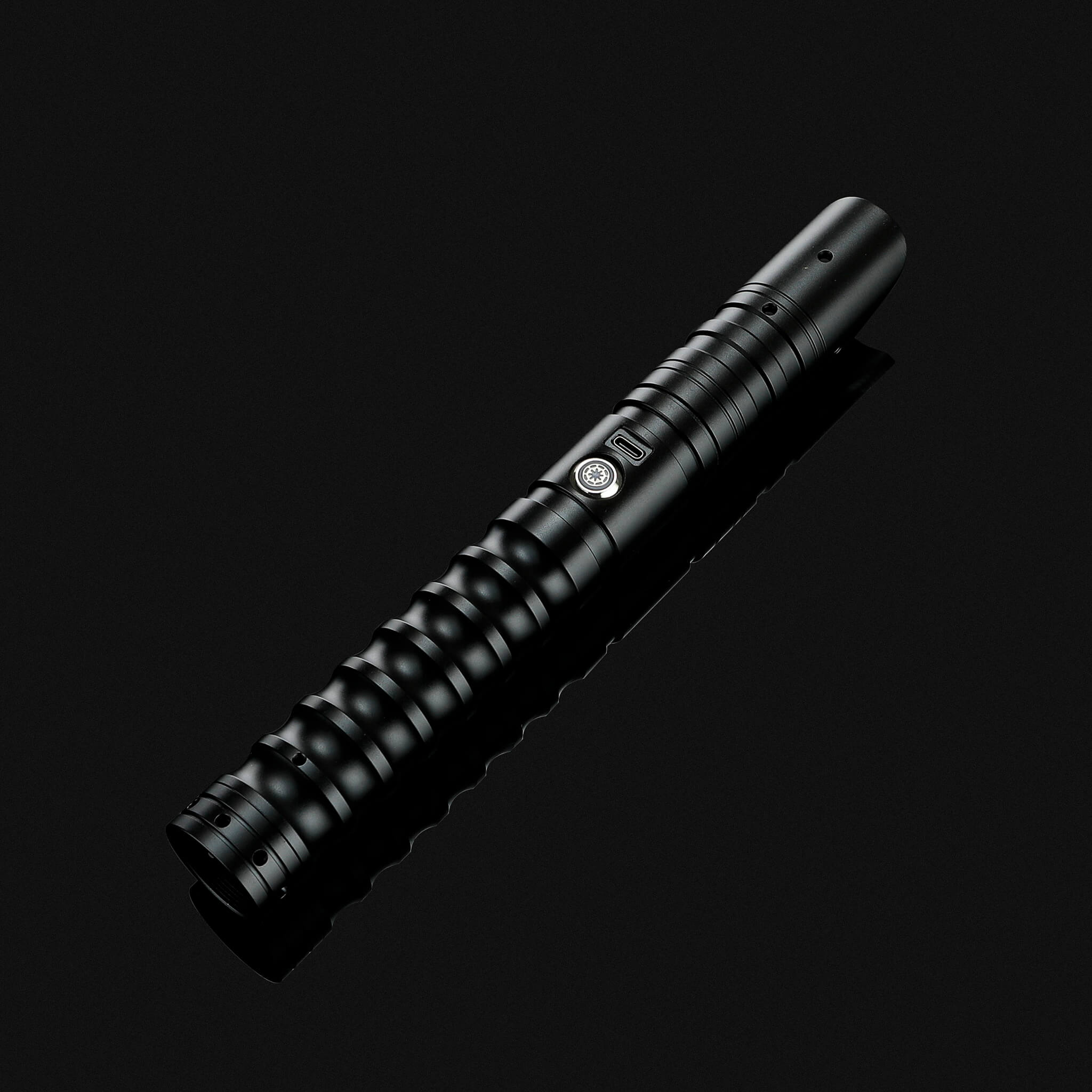 Side view of black metal lightsaber hilt