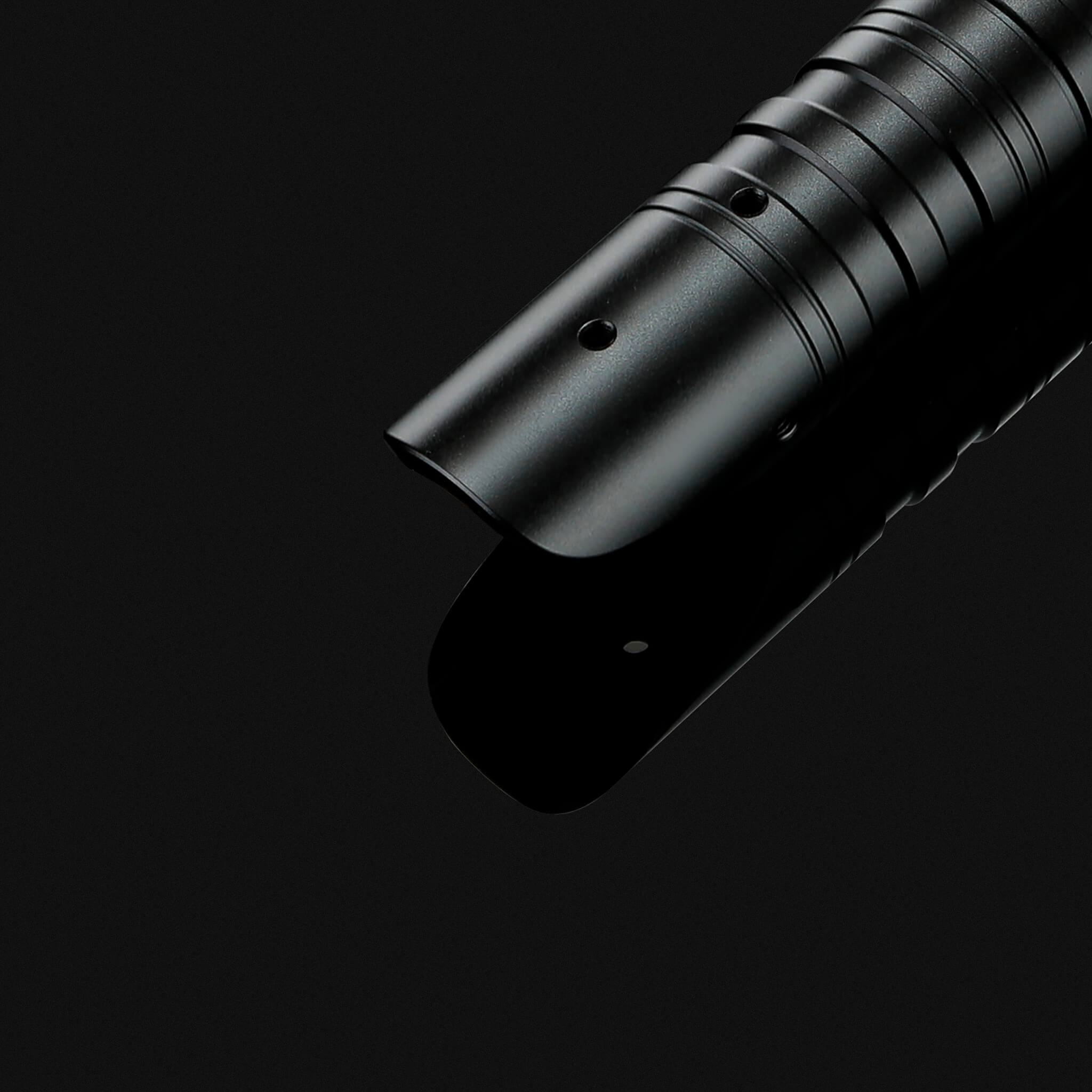 Emitter detail of heavy dueling metal lightsaber