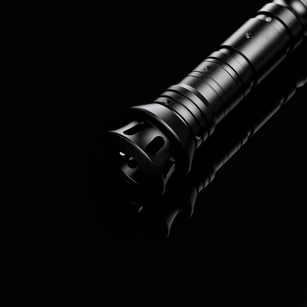 Vented emitter core detail on black metal hilt lightsaber