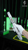 A close-up product demonstration video of the LIGHTSABER® Master Kelleran Beq Saber, showcasing its metallic hilt design, glowing green Pixel blade, and smooth swing motion control effects.